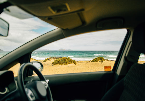 car parked at beach